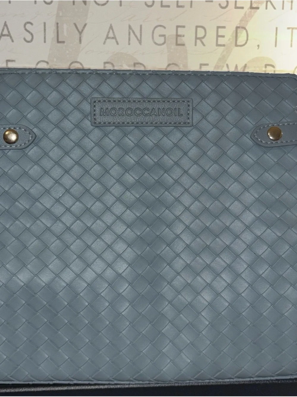 Moroccanoil Light Blue Woven Cosmetic Case & Bottle Body Lotion with M Logo.